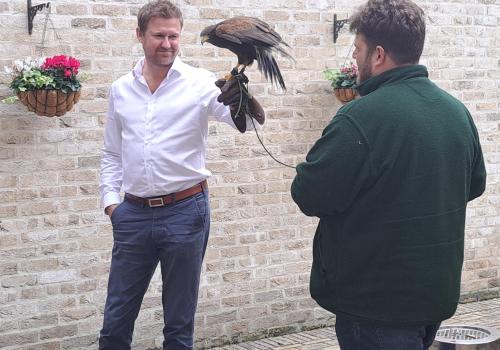 Ben Randall introduces the birds to CLS staff member